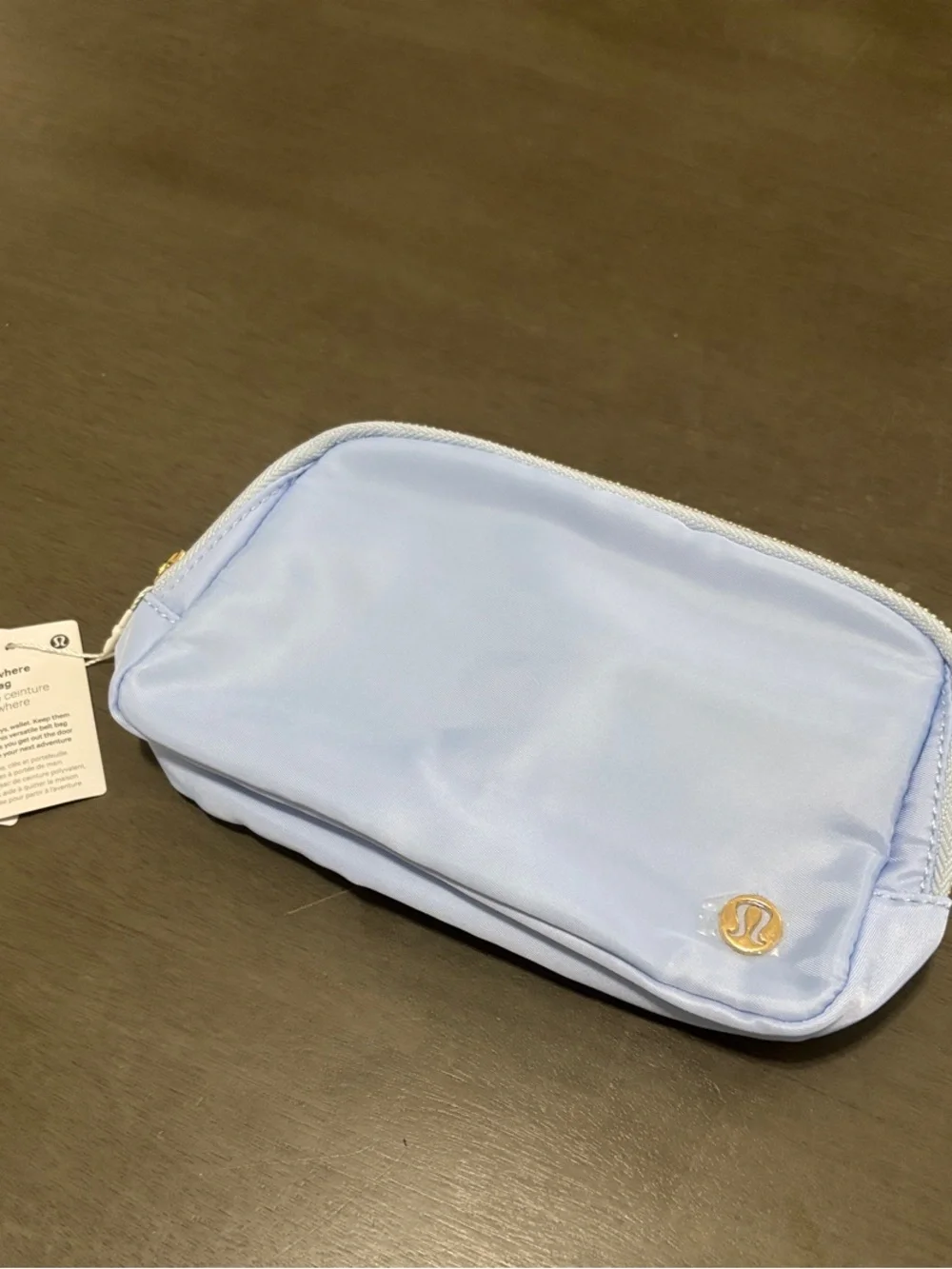 lululemon athletica Light Blue Zip Cosmetic Pouch with Gold Logo